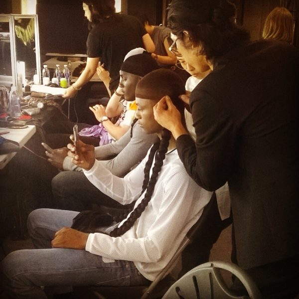 The boys braids being applied backstage at Sankaunz LCM SS16 show 